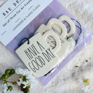 Pack of 3 white mug shaped Rae Dunn "Have a Good Day" scented car fresheners